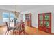 Formal dining room with hardwood floors, chandelier, and wooden furniture at 4817 Carlene Sw Way, Lilburn, GA 30047