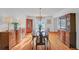 Formal dining room with hardwood floors, chandelier and wooden furniture at 4817 Carlene Sw Way, Lilburn, GA 30047