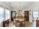 Bright dining room with chandelier and hardwood floors at 1965 Tiner Ct, Cumming, GA 30041