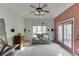 Living room with vaulted ceiling and french doors at 1965 Tiner Ct, Cumming, GA 30041