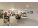 Spacious finished basement with a wet bar, ceiling fan, and comfortable seating area at 3639 Fowler Rdg, Douglasville, GA 30135
