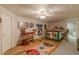 Finished basement area with wet bar, refrigerator and unique decorative accents at 3639 Fowler Rdg, Douglasville, GA 30135