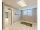 Finished basement with tile flooring and neutral walls and decor at 3639 Fowler Rdg, Douglasville, GA 30135