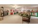 Large finished basement featuring a wet bar, tv, seating area, and Coca-Cola decor at 3639 Fowler Rdg, Douglasville, GA 30135