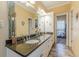 Spacious bathroom featuring granite counters, double sinks, tile floor, and great natural light at 3639 Fowler Rdg, Douglasville, GA 30135