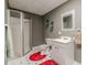 Clean bathroom with tiled floor, vanity, mirror, and glass shower door at 3639 Fowler Rdg, Douglasville, GA 30135
