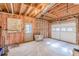 Unfinished garage interior with insulated walls and plenty of open space at 3639 Fowler Rdg, Douglasville, GA 30135
