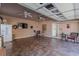Finished garage with a refrigerator, television, exercise equipment and space for multiple cars at 3639 Fowler Rdg, Douglasville, GA 30135