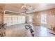 Spacious garage with high ceilings, multiple windows, and tiled floors at 3639 Fowler Rdg, Douglasville, GA 30135