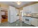 Kitchen with white appliances and tile flooring at 3639 Fowler Rdg, Douglasville, GA 30135