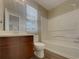 Bathroom with double vanity, toilet, and bathtub at 4248 Catalpa Ct, Ellenwood, GA 30294