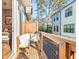 Private balcony with wooden seating and a view of the neighborhood at 4462 Dandelion Ln, Atlanta, GA 30342