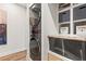 Bright laundry room with shelving and a built-in counter at 4462 Dandelion Ln, Atlanta, GA 30342