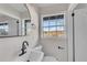 Stylish bathroom with a modern vanity and window at 2933 Edna Ln, Decatur, GA 30032