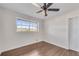 Spacious bedroom featuring hardwood floors and a ceiling fan at 2933 Edna Ln, Decatur, GA 30032