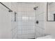 Clean shower with subway tile and black accents at 2933 Edna Ln, Decatur, GA 30032