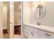 Bathroom with vanity, updated fixtures and a mirror at 318 Liberty Ln, Canton, GA 30114