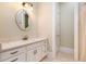 Bathroom with vanity, updated fixtures and a mirror at 318 Liberty Ln, Canton, GA 30114