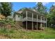 House exterior showcasing a large porch at 318 Liberty Ln, Canton, GA 30114