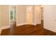 Hardwood floor hallway with access to bedrooms and bathroom at 318 Liberty Ln, Canton, GA 30114