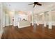 Open concept kitchen with white cabinets and hardwood floors at 318 Liberty Ln, Canton, GA 30114