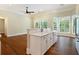 Island kitchen with white cabinets and quartz countertops at 318 Liberty Ln, Canton, GA 30114