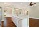 Open concept kitchen with island and white cabinets at 318 Liberty Ln, Canton, GA 30114