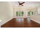 Bright living room with hardwood floors and large windows at 318 Liberty Ln, Canton, GA 30114