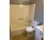 Bathroom with tub/shower combo, toilet and white vanity at 5234 Maroney Mill Rd, Douglasville, GA 30134