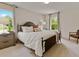 Main bedroom with king-size bed and neutral decor at 8231 Walnut Hall Dr, Fairburn, GA 30213