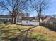 Large backyard with grassy area and partially visible house at 1639 Stokes Sw Ave, Atlanta, GA 30310