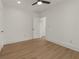 Spacious bedroom with hardwood floors and an additional door at 1639 Stokes Sw Ave, Atlanta, GA 30310