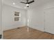 Bright bedroom with hardwood floors and ceiling fan at 1639 Stokes Sw Ave, Atlanta, GA 30310