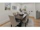 Bright dining room features a large table with seating for six at 1639 Stokes Sw Ave, Atlanta, GA 30310