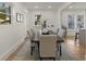 Bright dining room with hardwood floors and a large dining table at 1639 Stokes Sw Ave, Atlanta, GA 30310