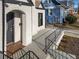 Inviting front porch with brick and wrought iron at 1639 Stokes Sw Ave, Atlanta, GA 30310