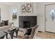 Elegant living room with fireplace and comfortable seating area at 1639 Stokes Sw Ave, Atlanta, GA 30310