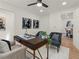 Modern home office with two chairs and a view to dining area at 1639 Stokes Sw Ave, Atlanta, GA 30310