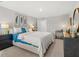 Bright bedroom featuring a king-size bed and stylish decor at 3201 Greyton Dr, Buford, GA 30519