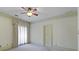 Bright bedroom with ceiling fan and large window at 325 Yellowroot Ln, Sandy Springs, GA 30350