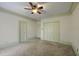 Spacious bedroom with double closets and carpet flooring at 325 Yellowroot Ln, Sandy Springs, GA 30350