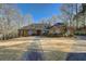 Brick house with landscaped yard and walkway at 325 Yellowroot Ln, Sandy Springs, GA 30350