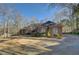 Ranch style brick home with a large driveway at 325 Yellowroot Ln, Sandy Springs, GA 30350