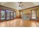 Gathering room with vaulted ceiling, hardwood floors, fireplace and access to deck at 325 Yellowroot Ln, Sandy Springs, GA 30350