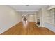 Bright living room with hardwood floors, fireplace and view to entry at 325 Yellowroot Ln, Sandy Springs, GA 30350