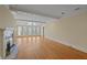 Sunlit living room with hardwood floors and high ceilings at 325 Yellowroot Ln, Sandy Springs, GA 30350