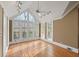 Sunroom with hardwood floors and wall-to-wall windows at 325 Yellowroot Ln, Sandy Springs, GA 30350