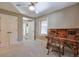 Bedroom with double doors and built-in desk at 531 Sweetfern Ln, Sugar Hill, GA 30518