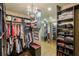 Large walk-in closet with ample shelving and hanging space at 531 Sweetfern Ln, Sugar Hill, GA 30518