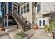 Back patio with stairs leading to the pool at 531 Sweetfern Ln, Sugar Hill, GA 30518